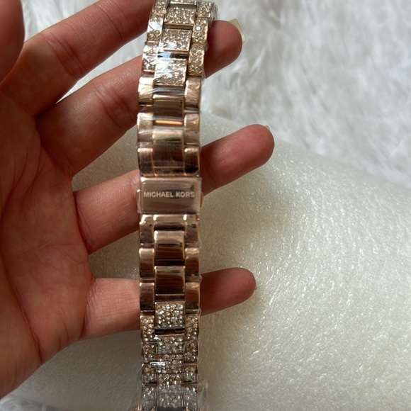 Michael Kors Apple Watch Rose Goldtone Stainless Steel & Crystal
Bracelet - Picture 11 of 15